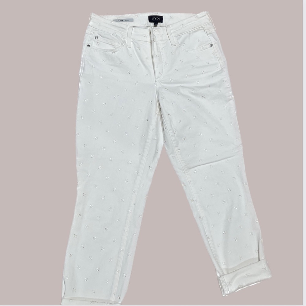 NYDJ cropped white jeans with little star detail. Size 4